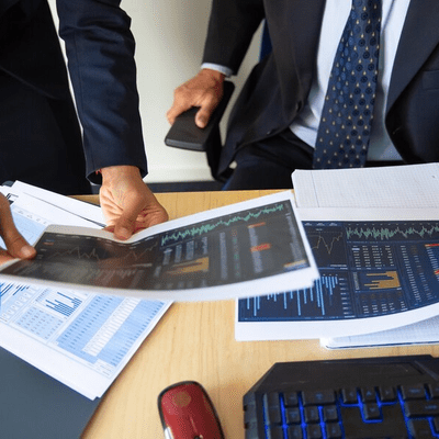Business people reviewing financial data.